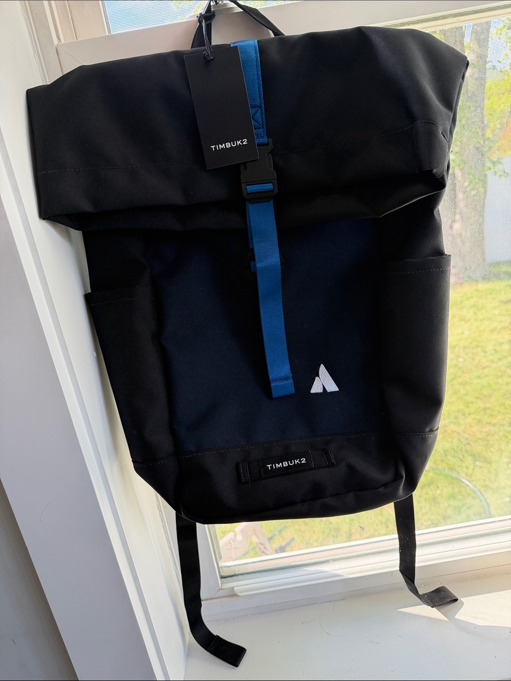 Timbuk2 Black Roll-Top Backpack with Blue Strap